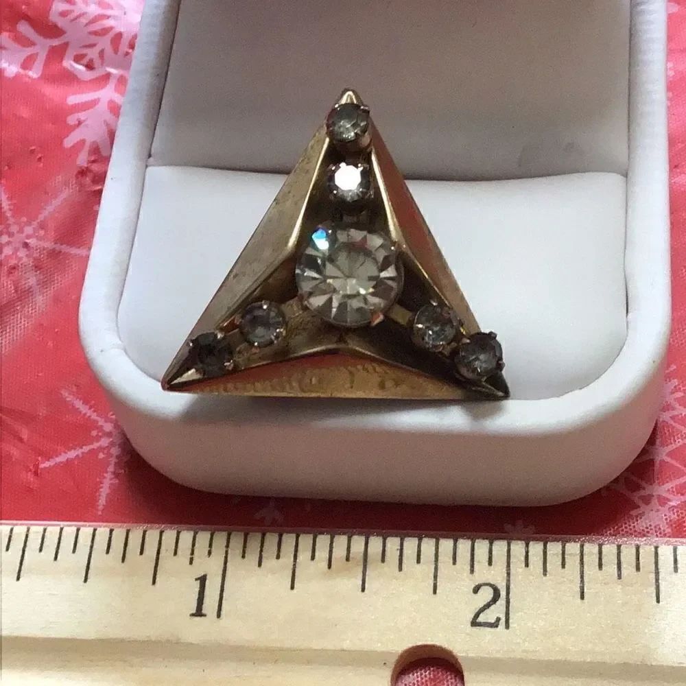 Vintage studded pyramid gold tone brooch